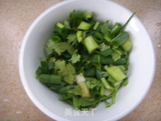 广式滑鸡粥--早上也能做美味的热粥的做法步骤：3