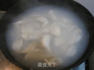 豇豆肉馅大饺子的做法步骤：12