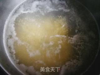 蜜薯桂圆小米粥的做法步骤：4