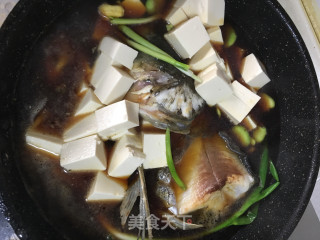 蚕豆瓣豆腐烧鱼头的做法步骤：7