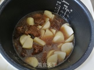 土豆烧排骨的做法步骤：7