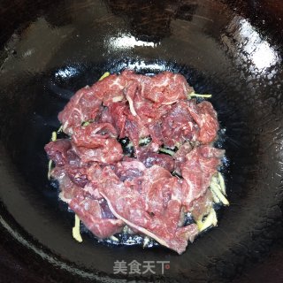 牛肉炒荷兰豆的做法步骤：7