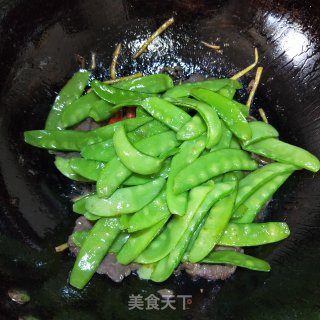 牛肉炒荷兰豆的做法步骤：9